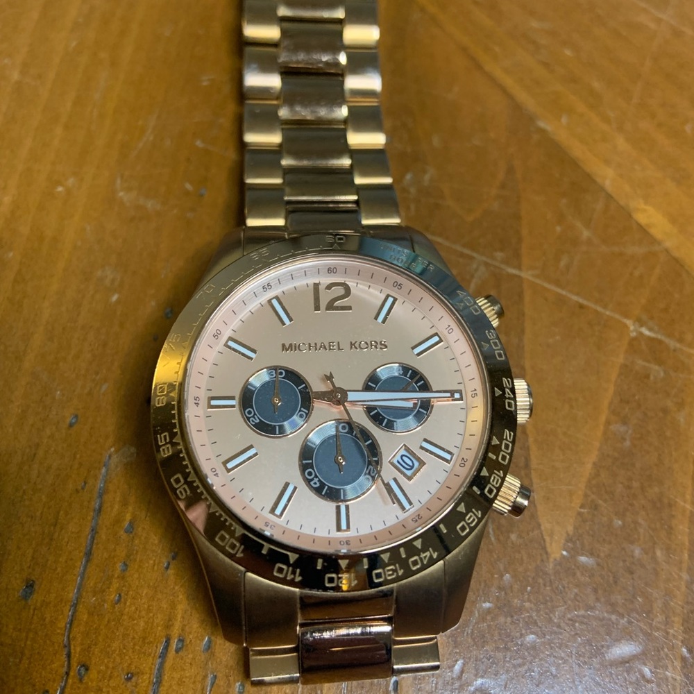 Michael Kors. Oversized. Stainless steel. Copper-colored.